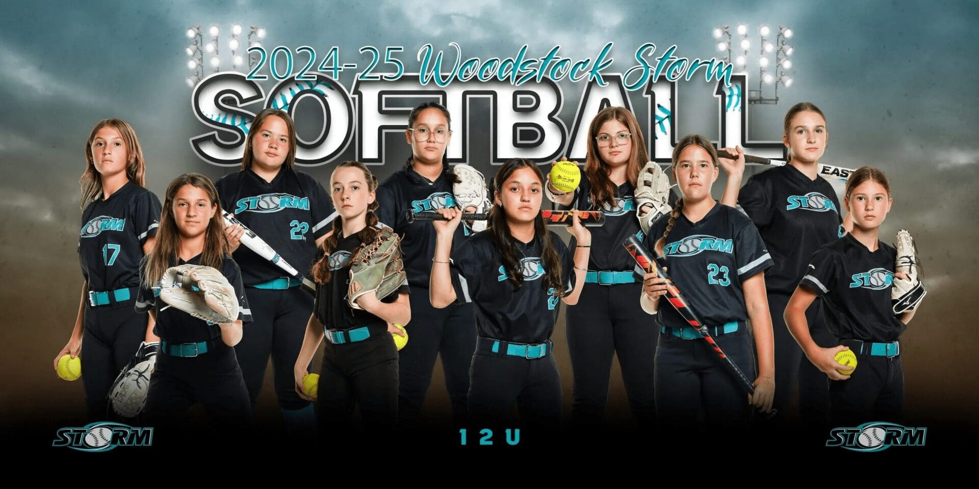 Youth softball team posing confidently with bats.