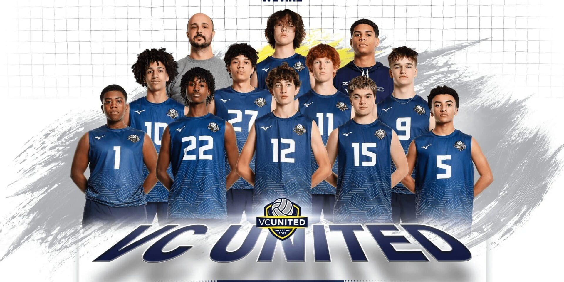 A diverse group of young basketball players posing in blue jerseys.