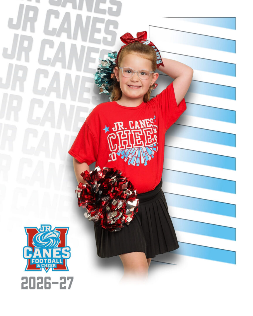 Cheerful girl in red shirt with pom-poms.